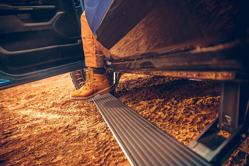 AMP Research 76240-01A PowerStep Plug-N-Play Automatic Running Boards for 2019-2024 Ram 1500 All Cabs - Black with OEM Illumination