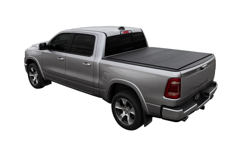 Access LOMAX Tri-Fold Hard Tonneau Cover for 2019-2020 Ram 1500 with 5' 7" Bed (W/O RamBox) - Black Urethane