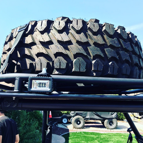 General-use  light pod with a universal mount on an off-road vehicle. 